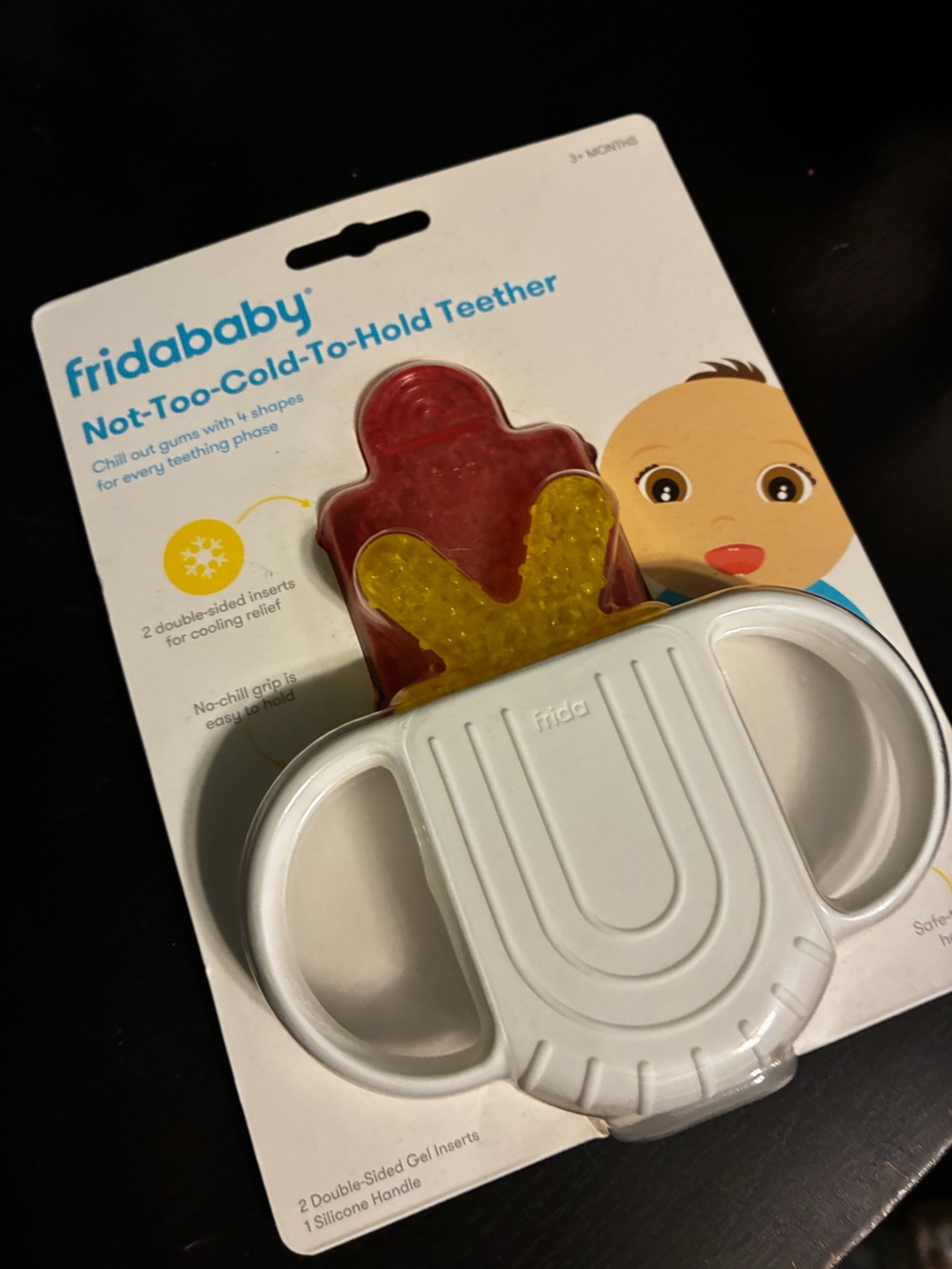 fridababy Not-Too-Cold-To-Hold Teether - White Handle with Red & Yellow Inserts